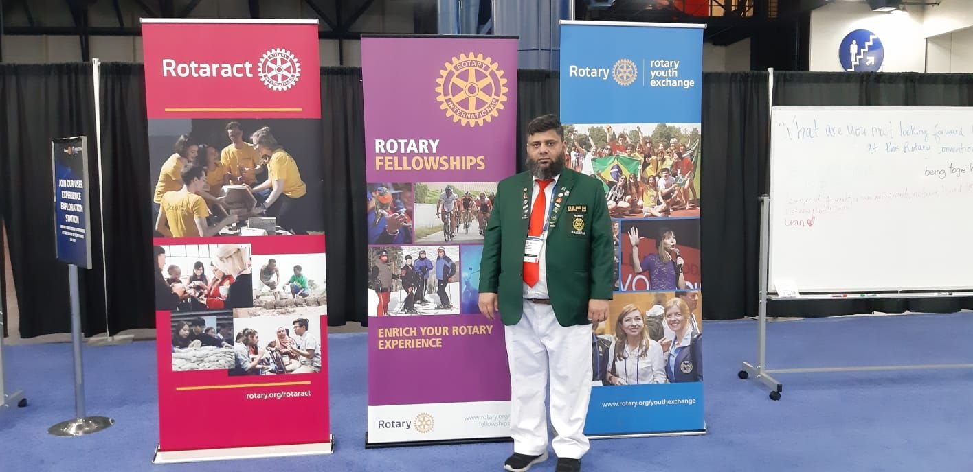 Dr. Ahmed Ejaz in a Pakistan delegation blazer at the Rotary International Convention